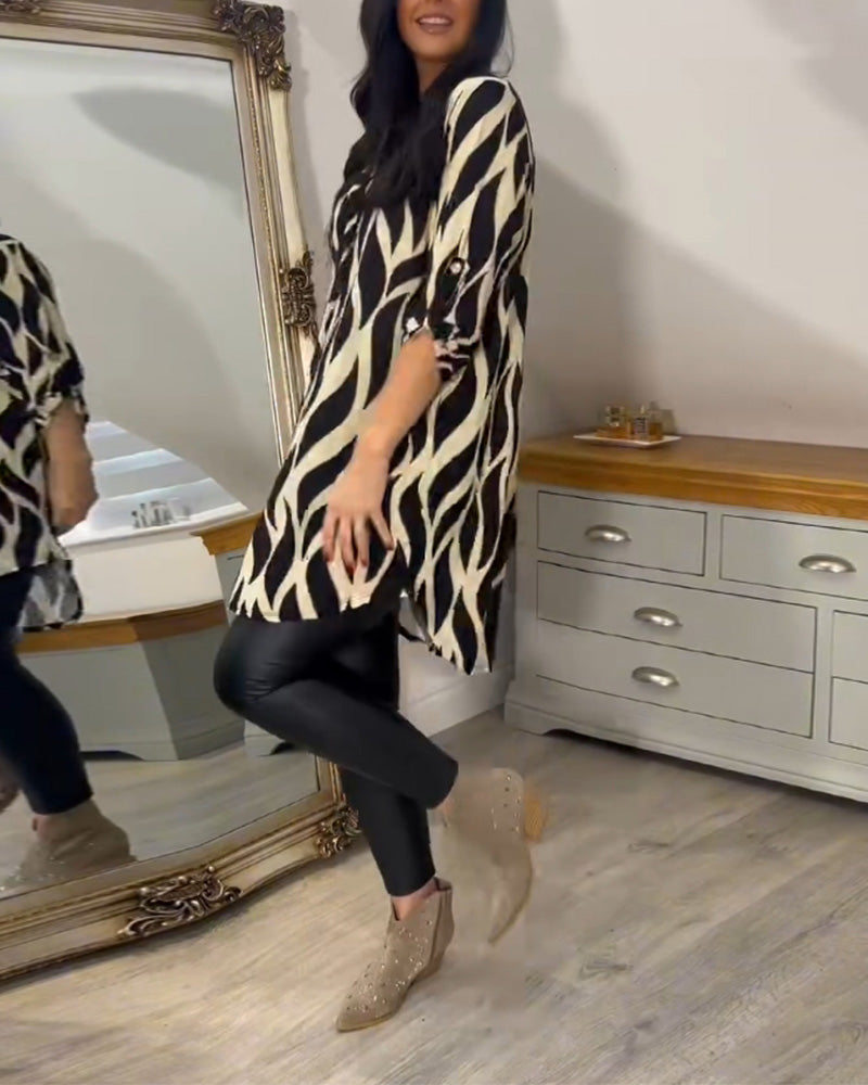 Louise – Tunikabluse med Abstrakt Mønster og 3/4 Ærmer