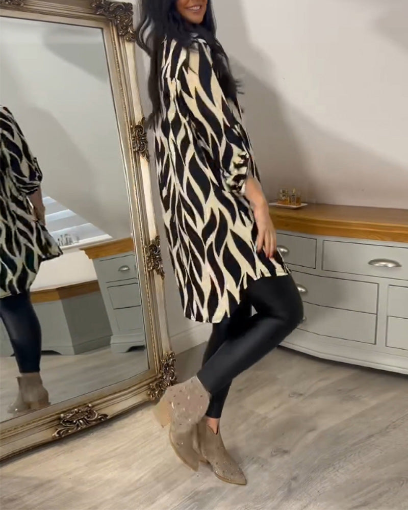 Louise – Tunikabluse med Abstrakt Mønster og 3/4 Ærmer